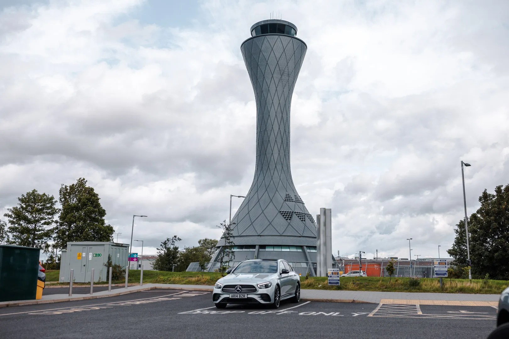 Executive Airport Transfer - Edinburgh to St Andrews in a Mercedes E-Class. Silver Mercedes E-Class at Edinburgh Airport, ready for executive transfer to St Andrews.