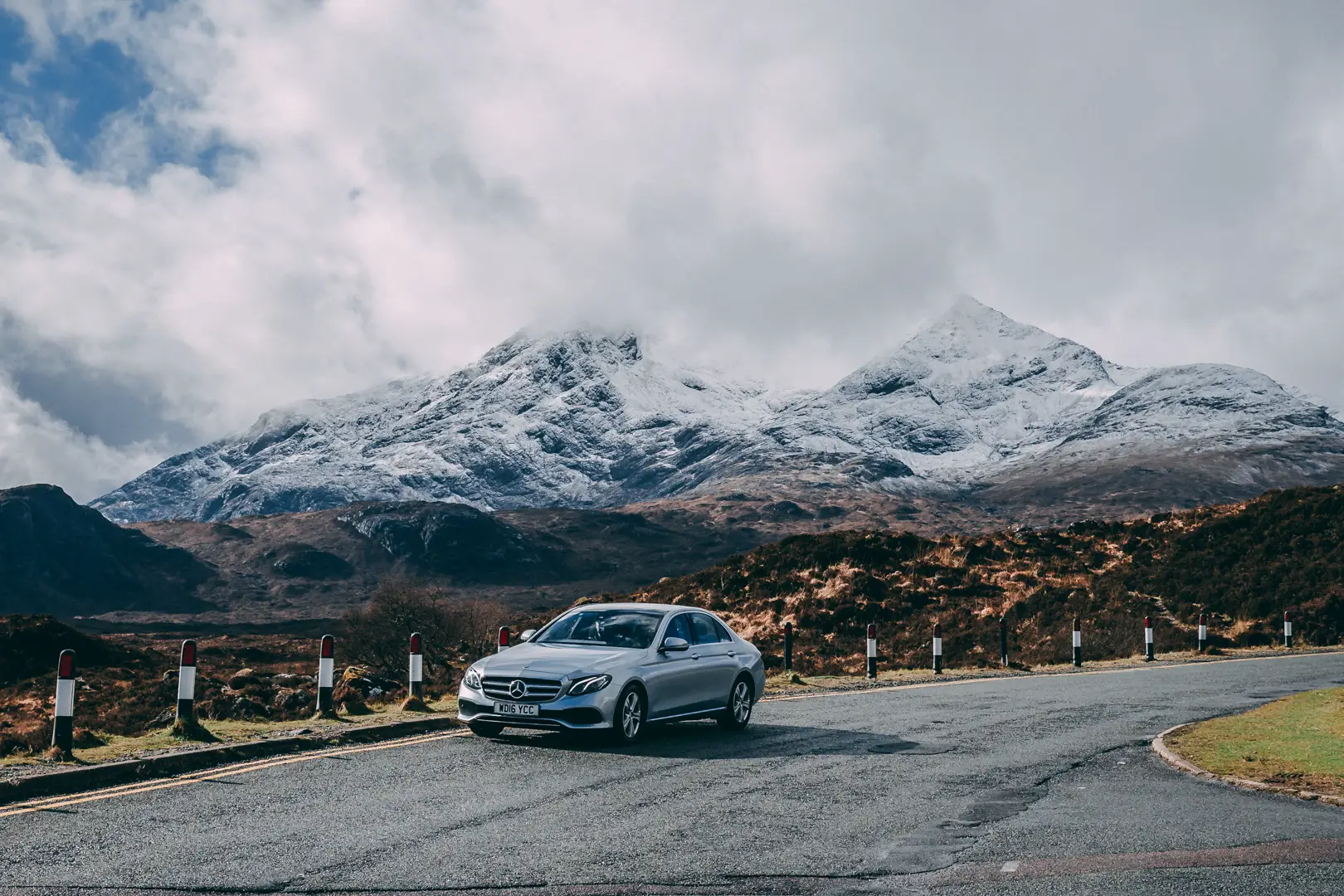 Edinburgh to St Andrews Scenic Transfer Route - Mercedes in the Highlands. Mercedes on a scenic route in the Scottish Highlands for a St Andrews transfer.