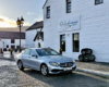 Mercedes-Benz E-Class at Dalwhinnie Distillery for an St Andrews executive transfer.