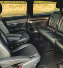 Inside view of a black Mercedes V-Class with comfortable seating for Scotland private tours and airport transfers.