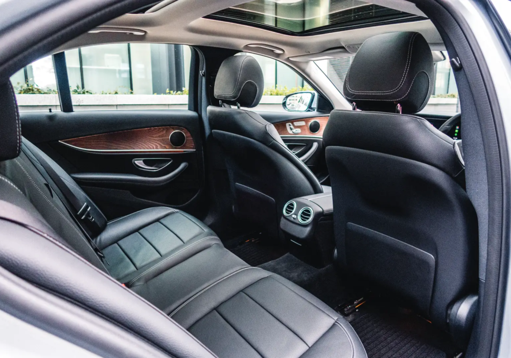 Executive Comfort and Navigation Ready - Inside a Mercedes-Benz Interior of a Mercedes-Benz showing leather seats and navigation system, ready for executive transfers in Scotland.